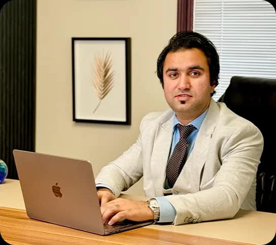 Haseeb Hamdani, FCCA and UAE Chartered Accountant, at his desk in the Bestax office.