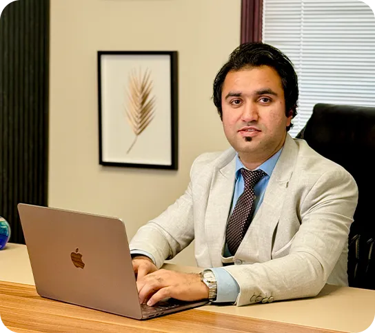 Haseeb Hamdani, FCCA and UAE Chartered Accountant, at his desk in the Bestax office.
