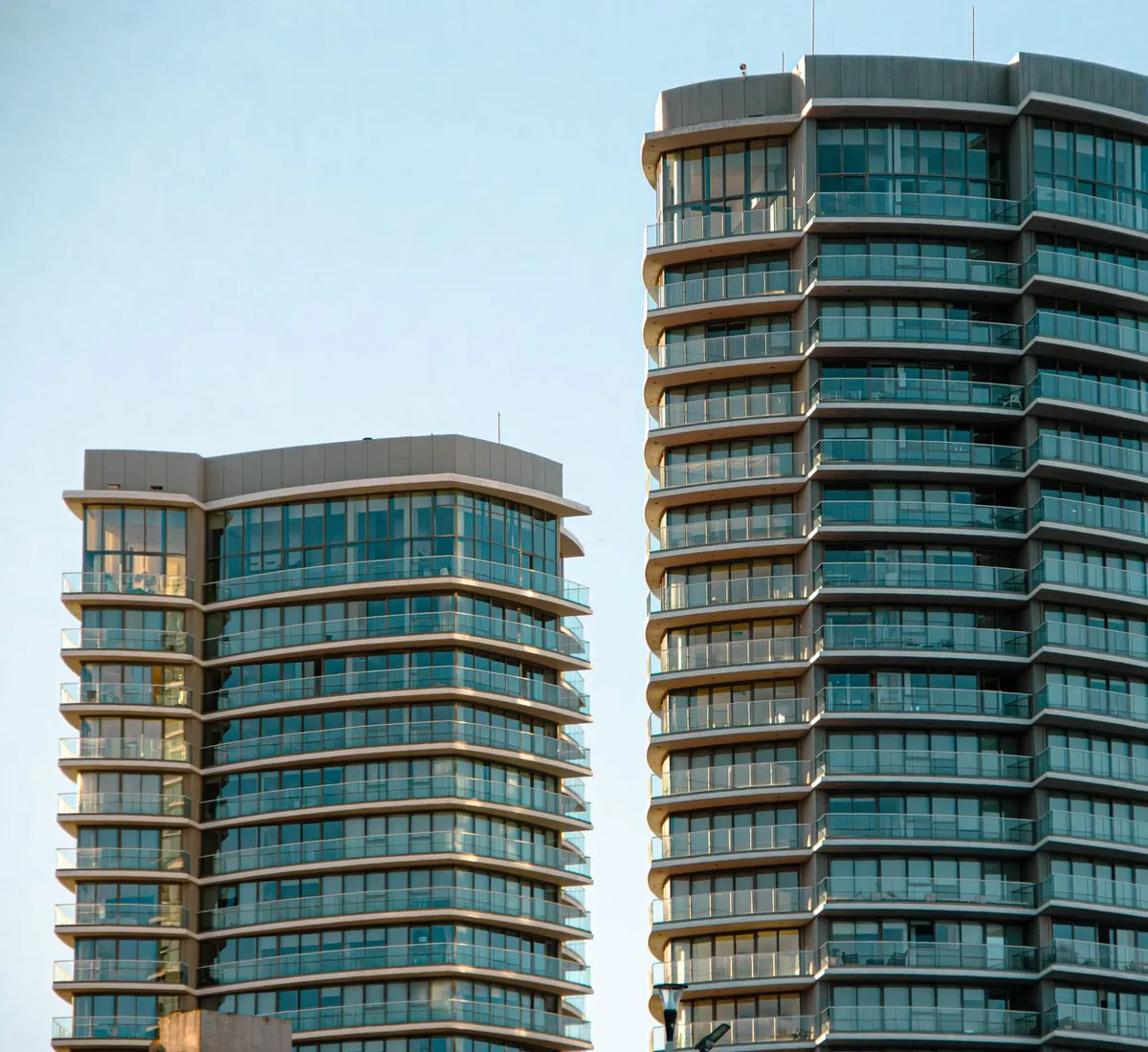 Dubai residential and commercial towers seen across the water, the market Bestax advises property owners on.