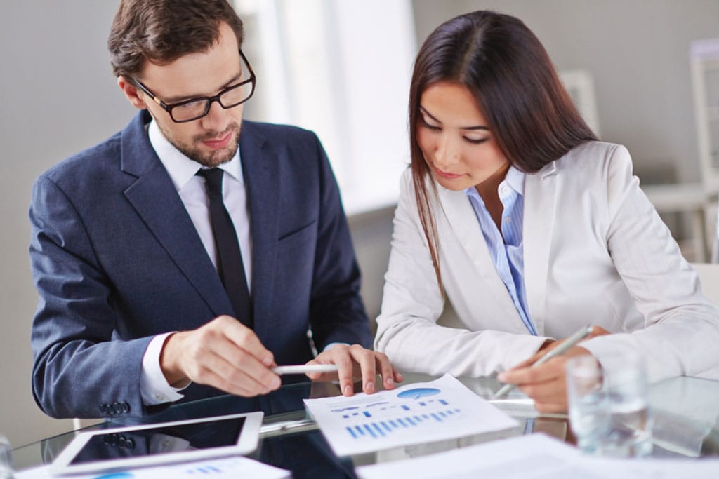 Two people focused on work